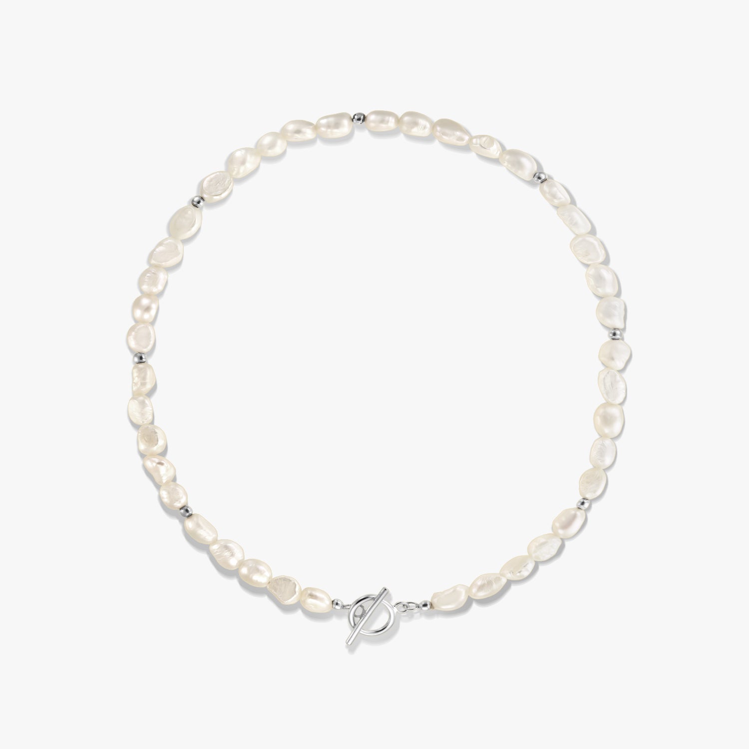 Square studio photo of a sterling silver necklace with natural freshwater pearls, small silver spacer beads, and a toggle clasp on a white background.