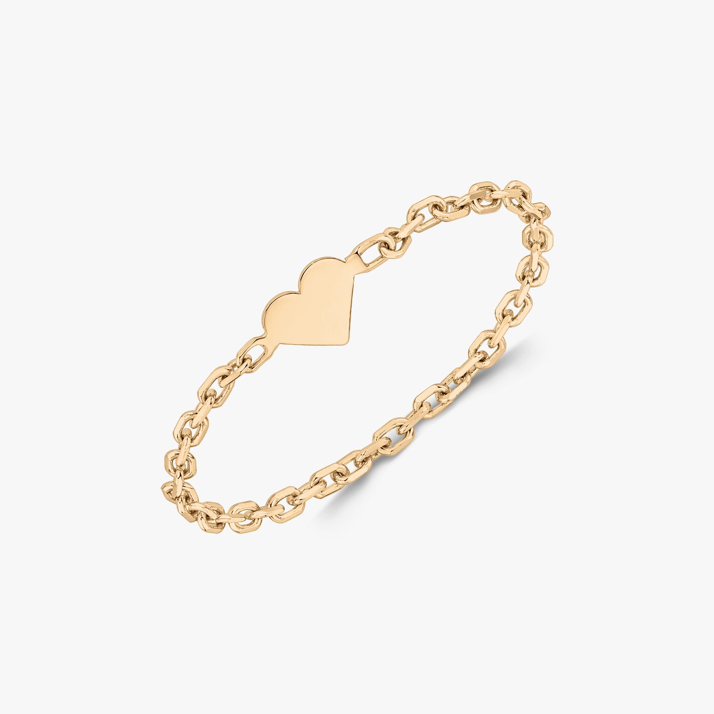 Gold chain ring with a heart-shaped centerpiece on a white background.