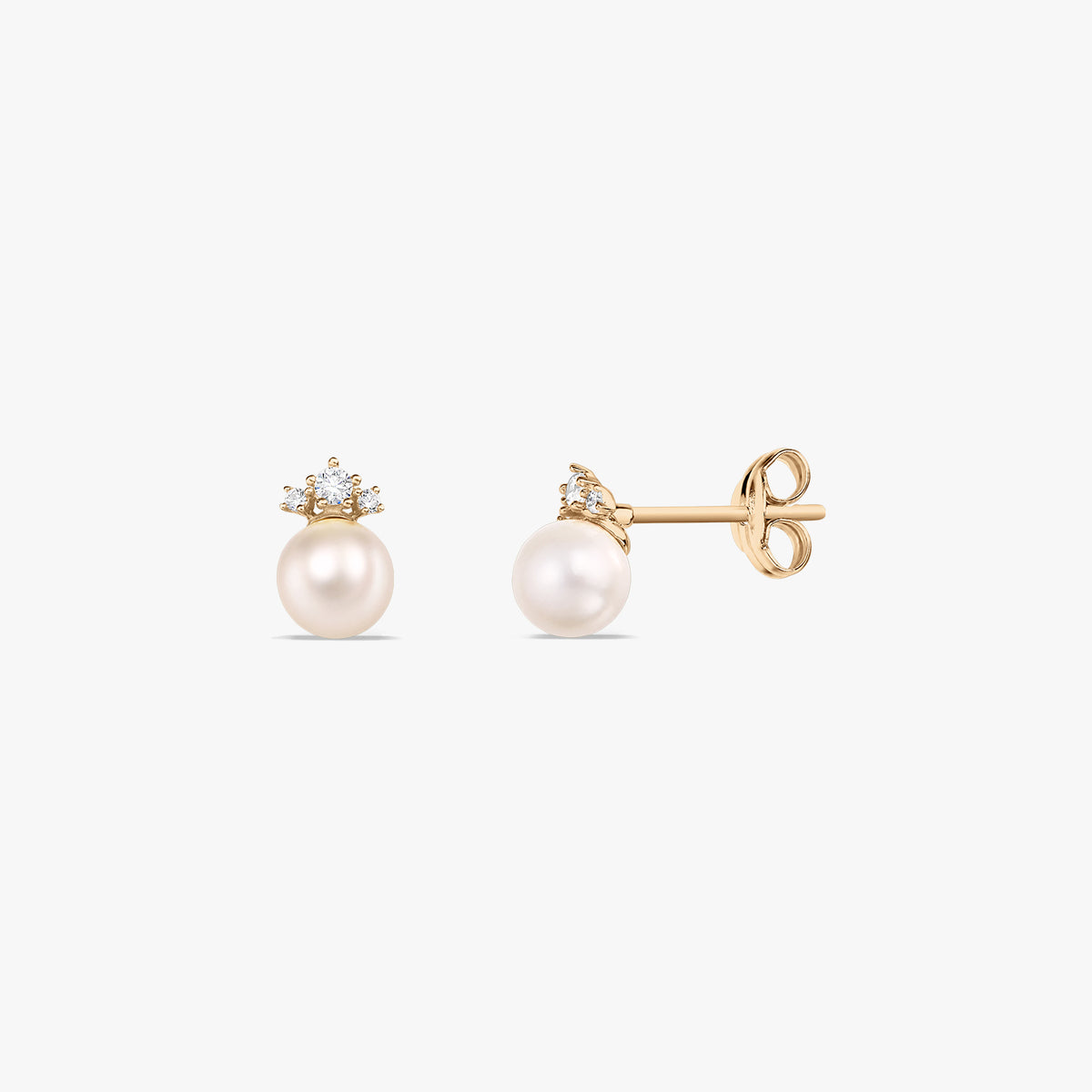 Pair of 14k yellow gold stud earrings with round natural pearls and delicate white zirconia crown accents, shown front and side on a white background.