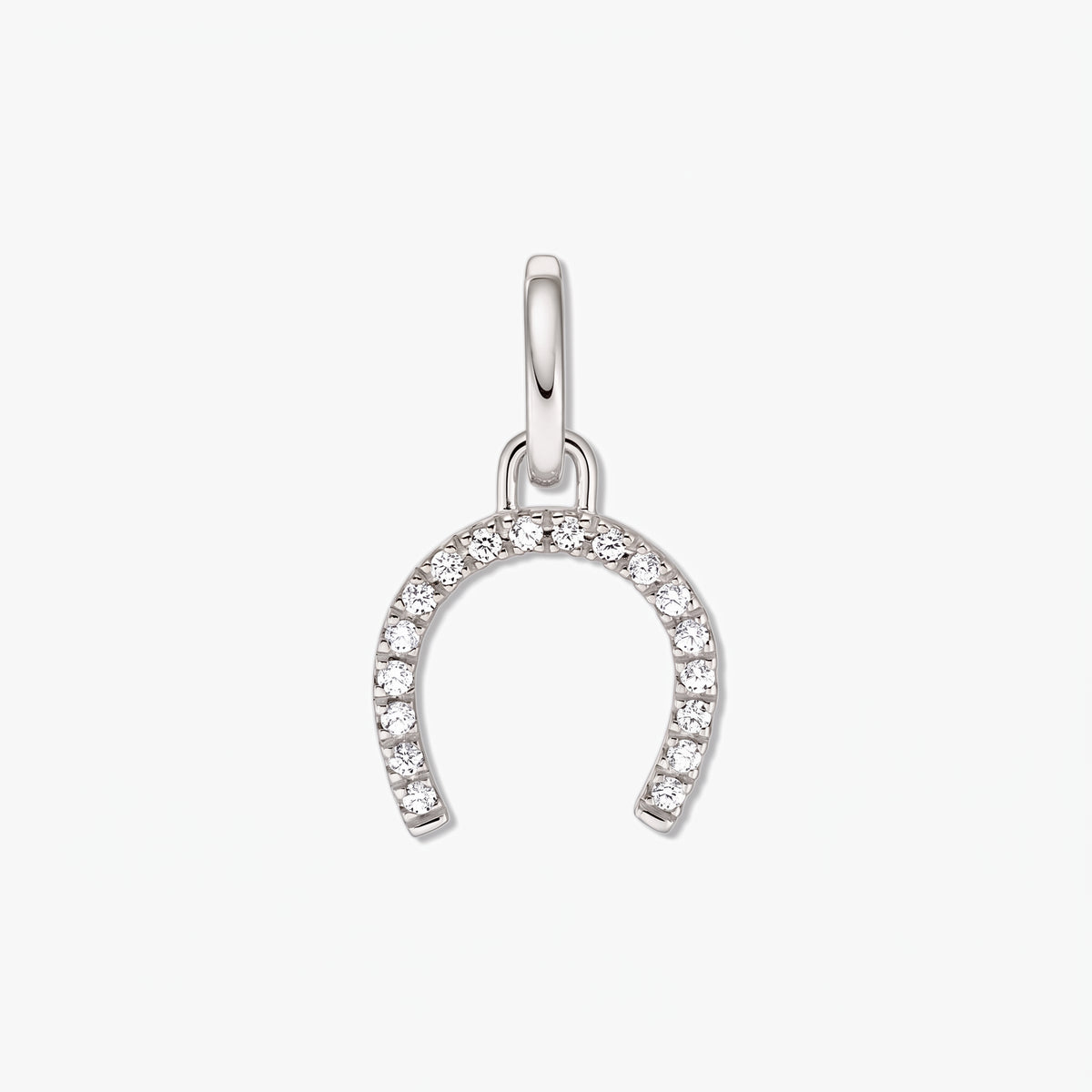 Sterling silver horseshoe pendant adorned with white zirconia stones on a white background.