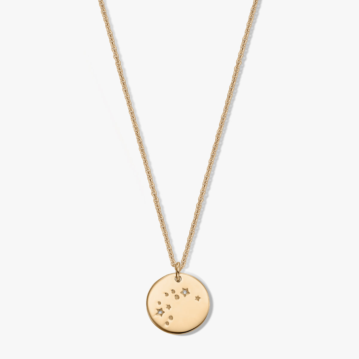 Gold-tone round pendant necklace showcasing the Aquarius constellation with delicate white sapphire accents on a fine chain, isolated on a white background.