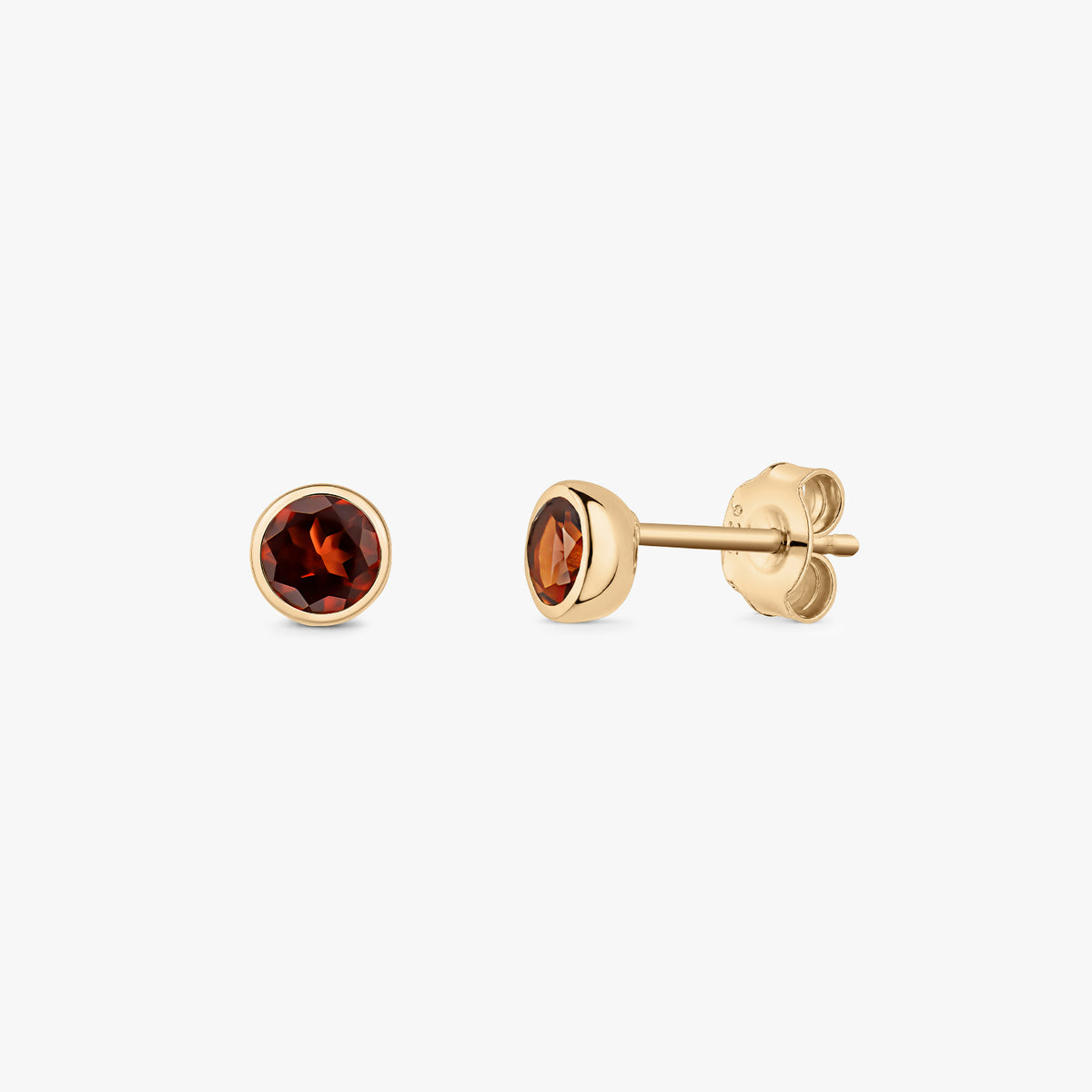 Pair of gold-plated sterling silver stud earrings featuring round, faceted garnet birthstones in bezel settings with butterfly backs, on a white background.