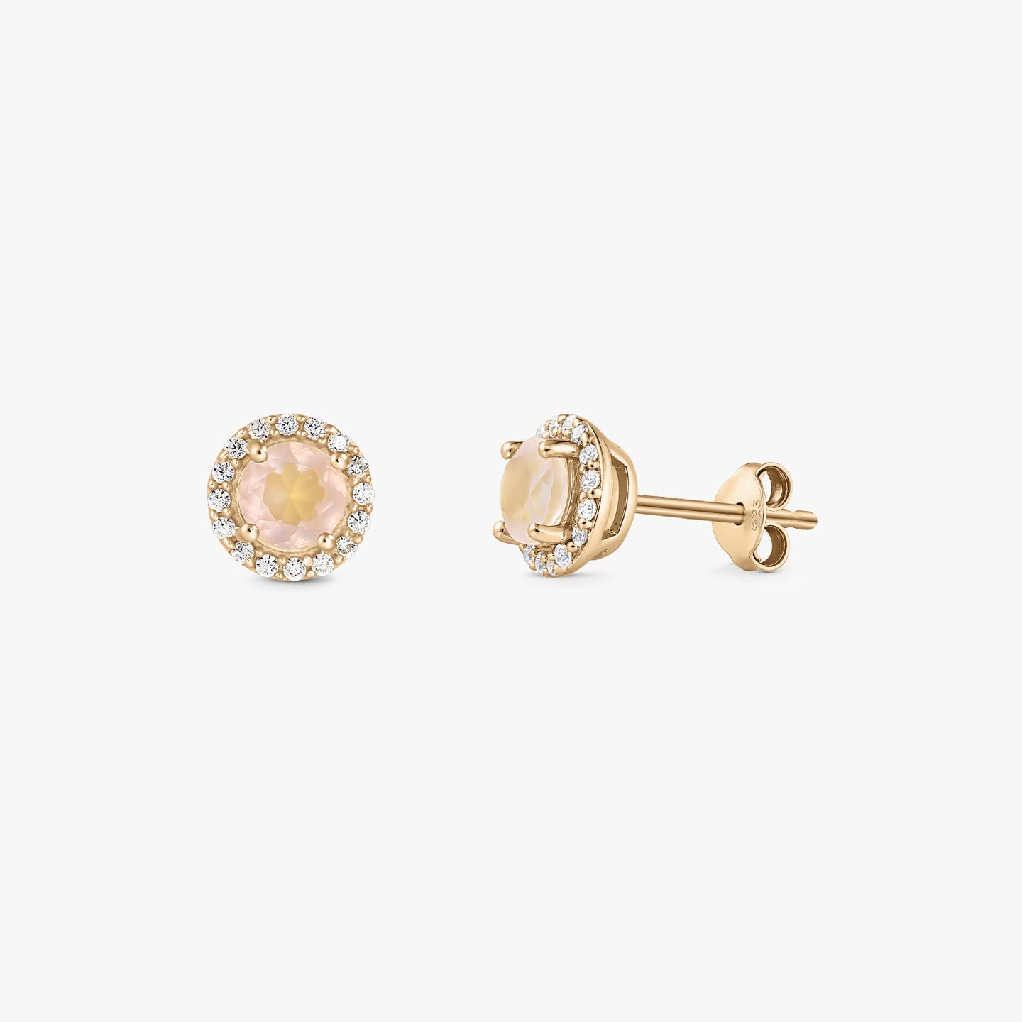 Pair of gold‑plated sterling silver stud earrings with a round rose quartz center and a halo of clear zirconia on a white background.