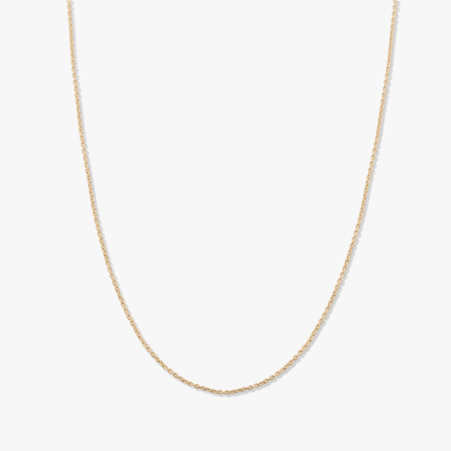 Minimal 14K yellow gold chain necklace photographed on a solid white background.