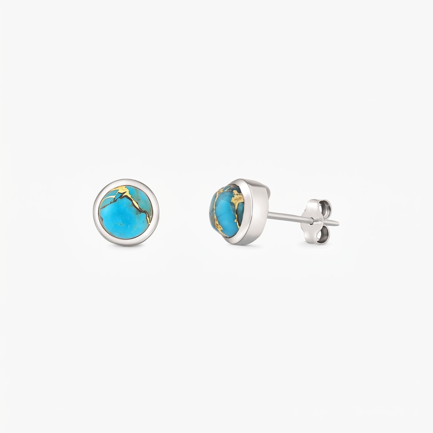 Pair of sterling silver stud earrings with round blue copper turquoise cabochons in bezel settings on a white background.