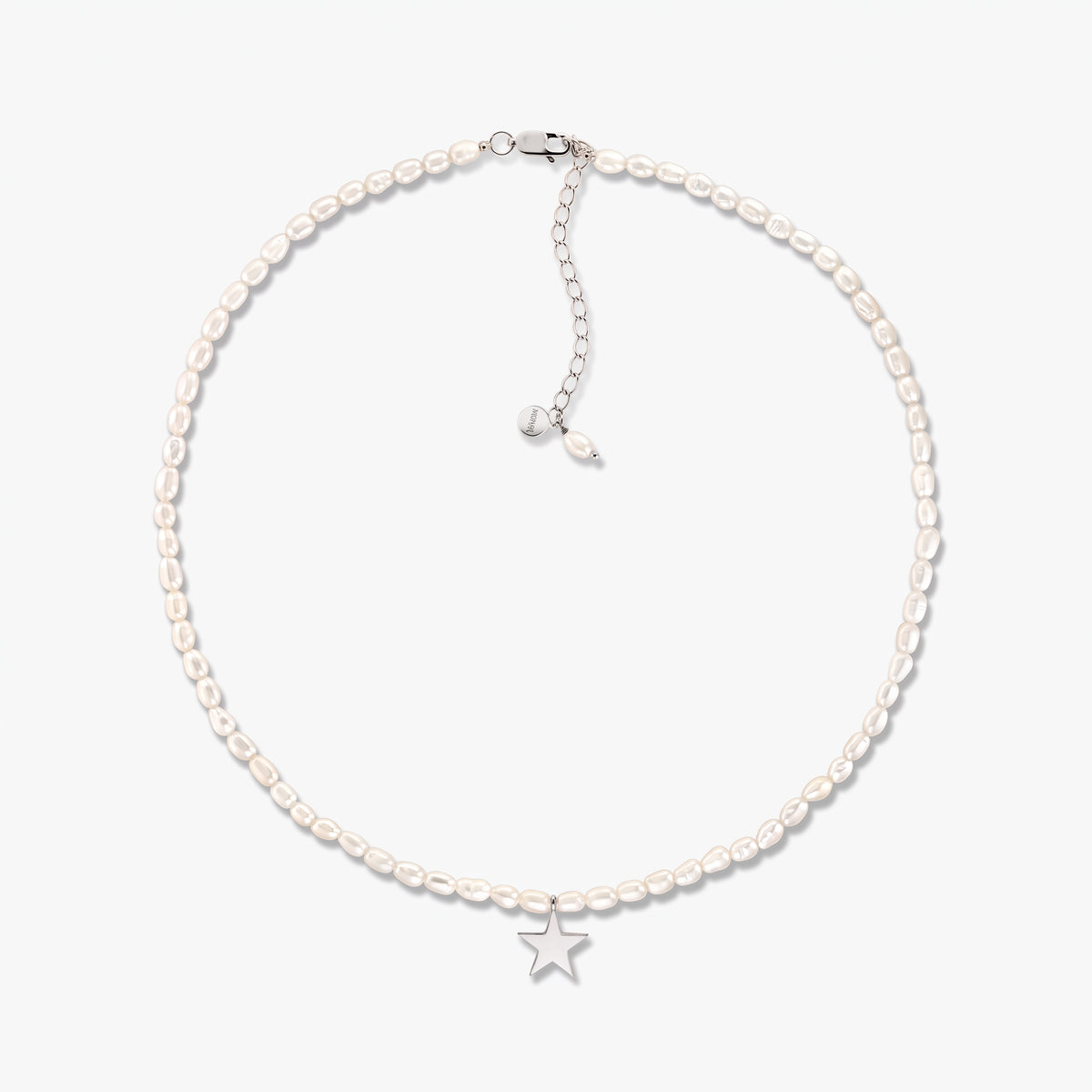 Tiana sterling silver necklace with cultured pearls and a small star pendant, displayed on a white background with an adjustable extender chain.