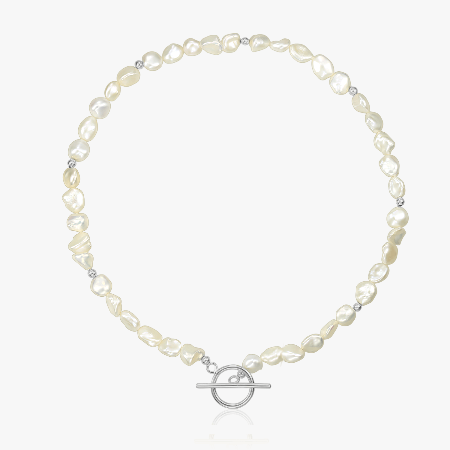 Silver necklace with natural pearls and a silver toggle clasp on a white background.