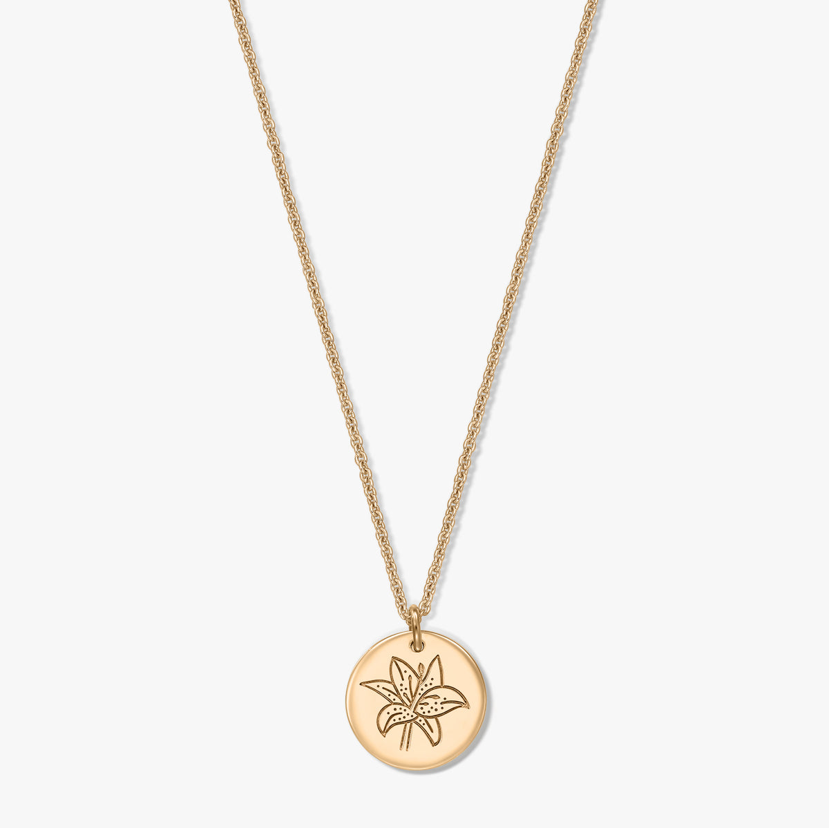 Gold‑tone 925 silver necklace with a round disc pendant engraved with a lily, shown centered on a white background.