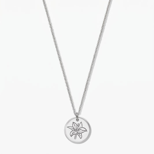 Sterling silver birth flower necklace featuring a round disc pendant engraved with a lily (May), shown on a white background.