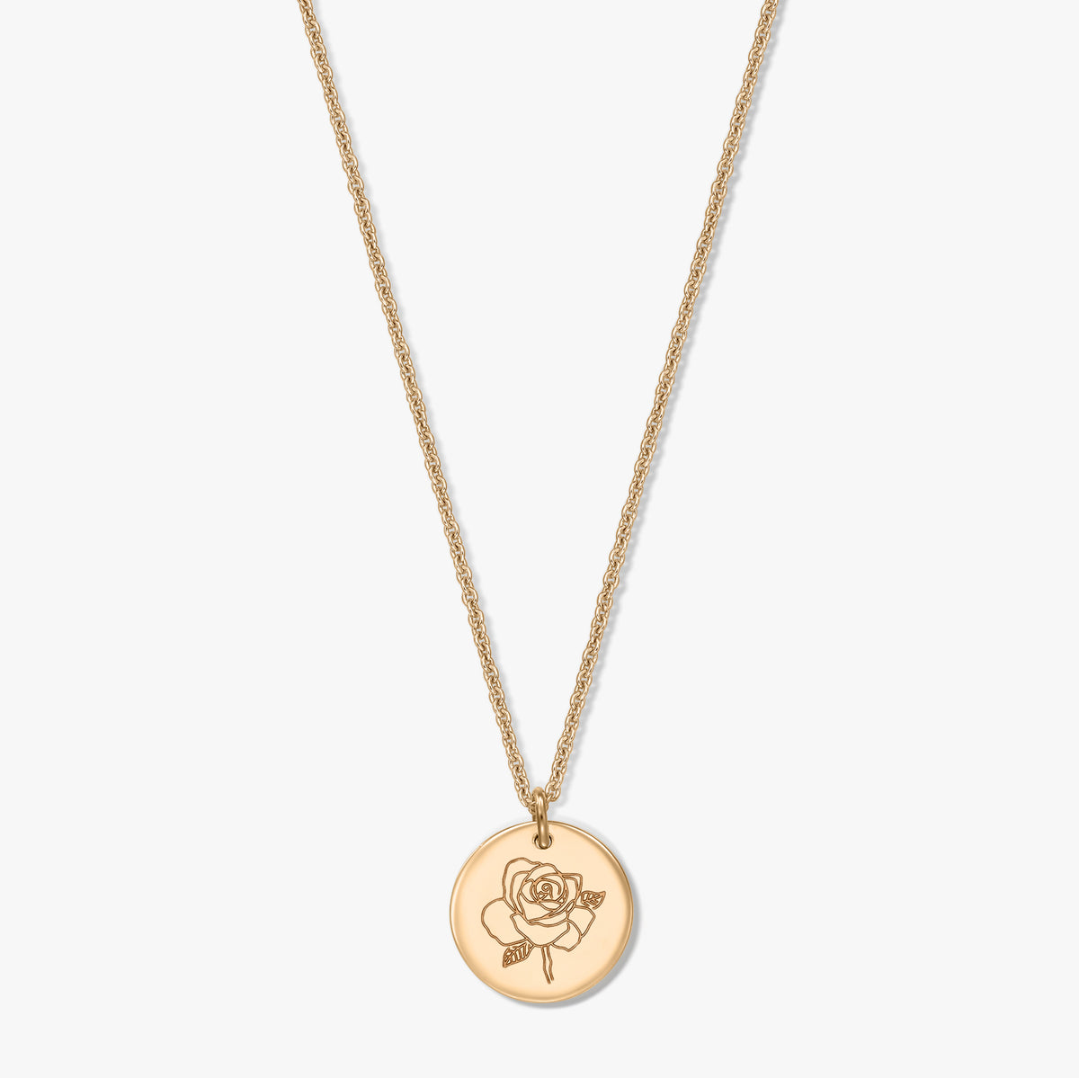 Elegant gold-plated silver necklace with a round rose-engraved medallion, centered on a white background.