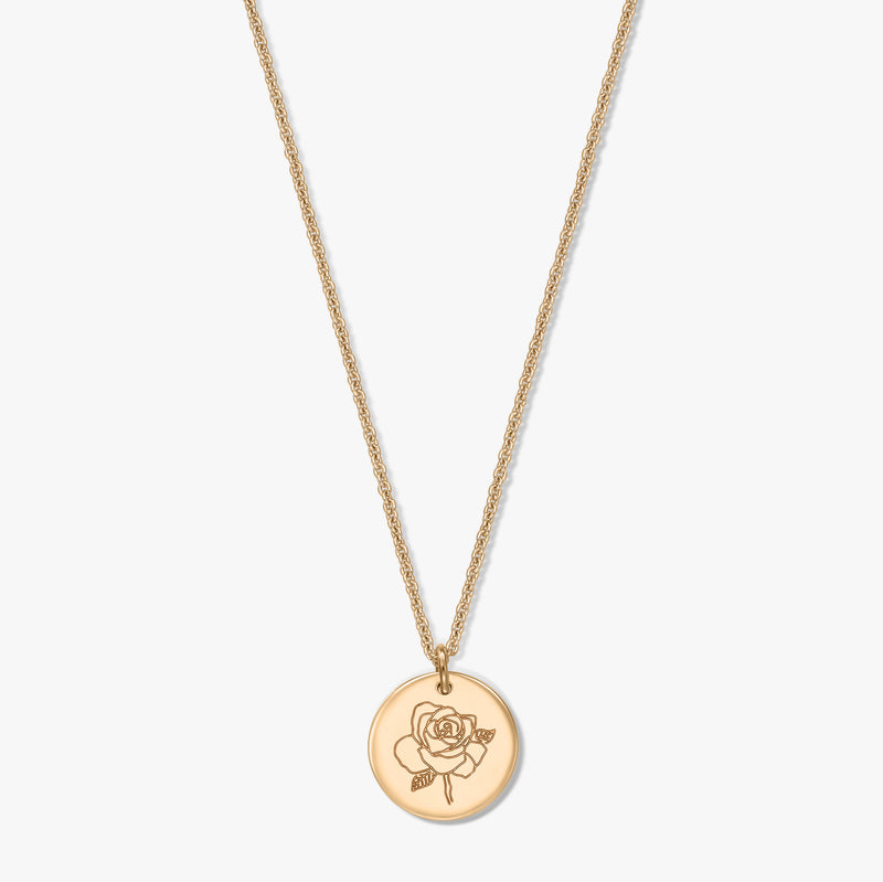 Elegant gold-plated silver necklace with a round rose-engraved medallion, centered on a white background.
