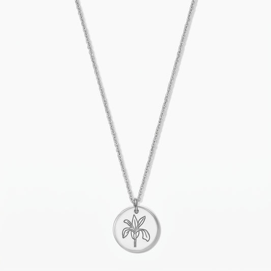 Elegant sterling silver necklace with a round pendant featuring an iris line-art motif on a white background.