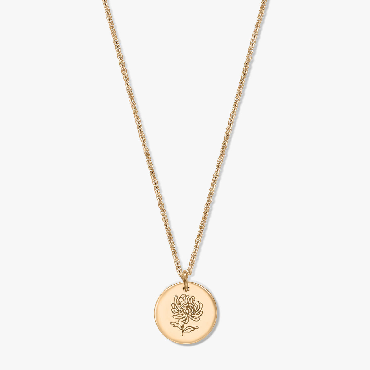 Gold-plated silver necklace featuring a round coin pendant engraved with a chrysanthemum—the November birth flower—on a white background.