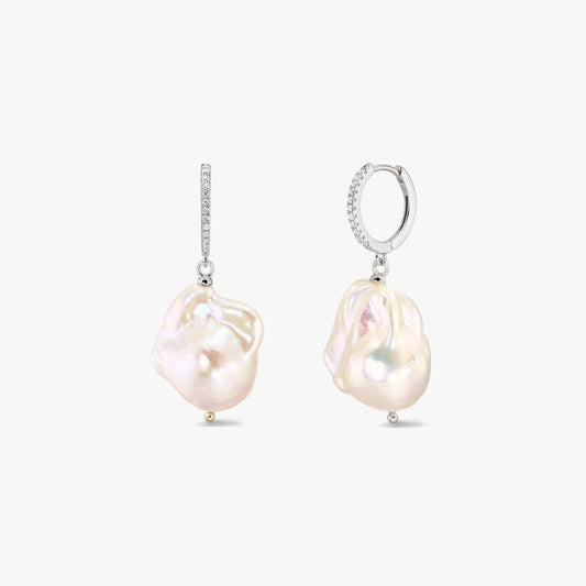 Elegant rhodium‑plated 925 silver hoop earrings with pavé zirconia and large organic baroque pearls on a white background.