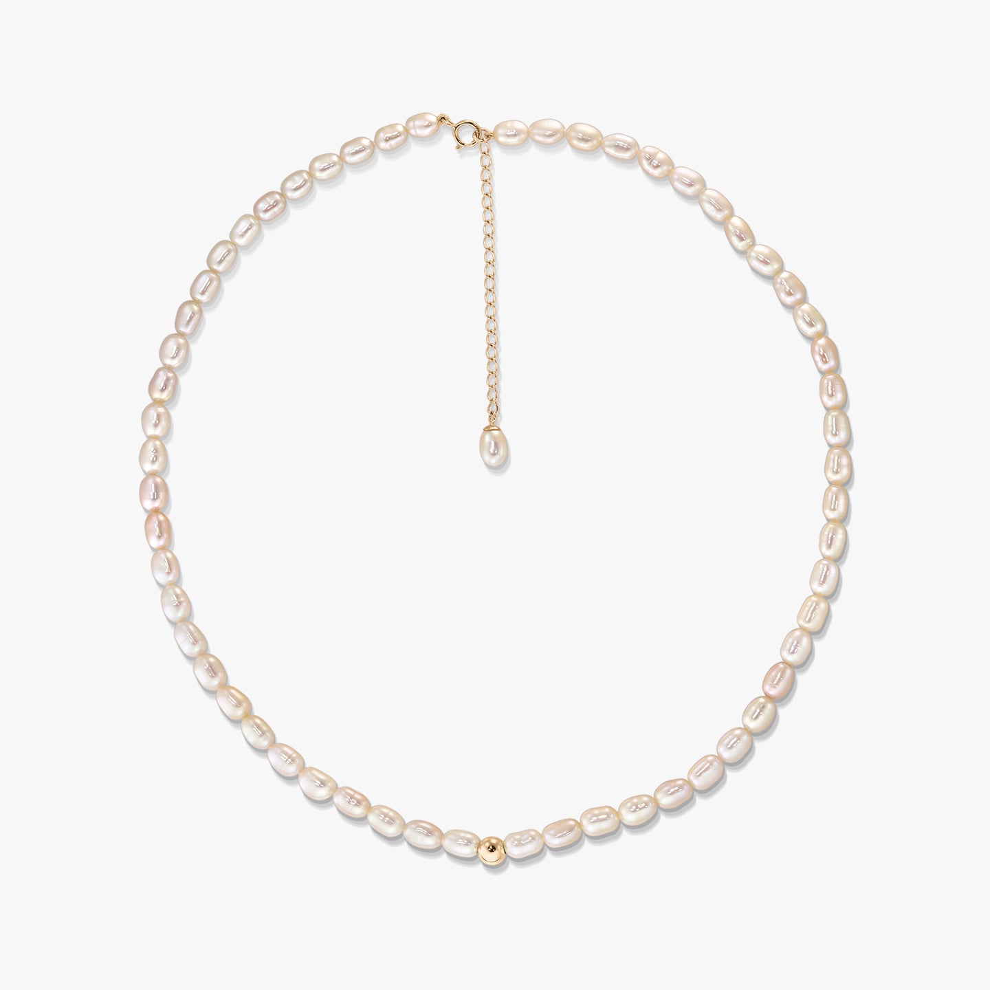 Blair gold necklace with natural oval pearls arranged in a circle on a white background, featuring a 14K gold clasp, extender chain, and a small gold accent bead.