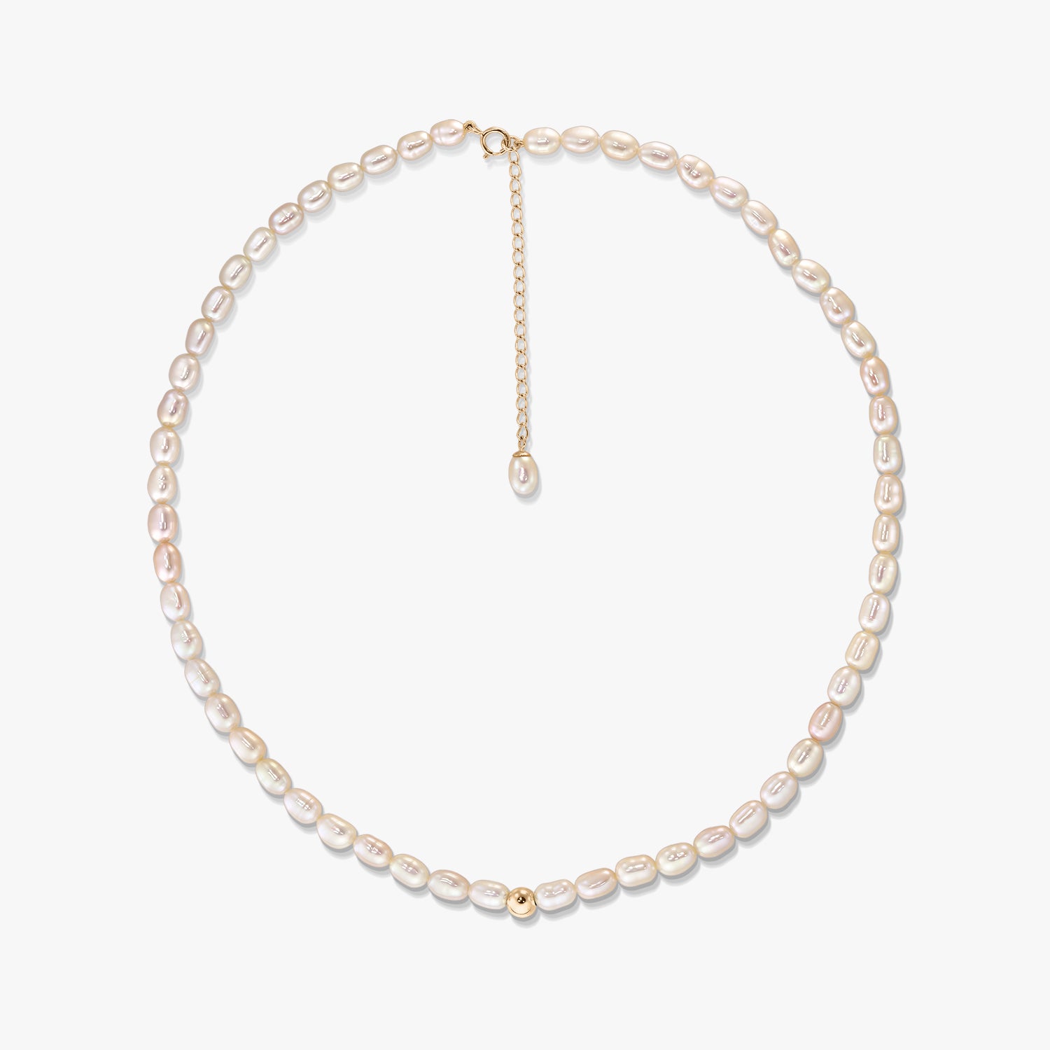 Blair gold necklace with natural oval pearls arranged in a circle on a white background, featuring a 14K gold clasp, extender chain, and a small gold accent bead.