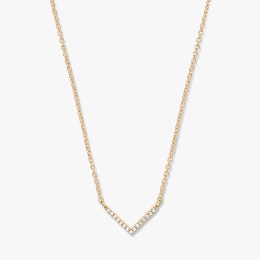 Golden V-shaped zirconia pendant necklace on a delicate chain, photographed on a white background.