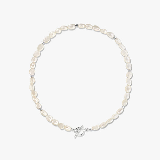 Silver Grace necklace with natural freshwater pearls and sterling silver spacer beads, finished with a silver toggle clasp on a white background.