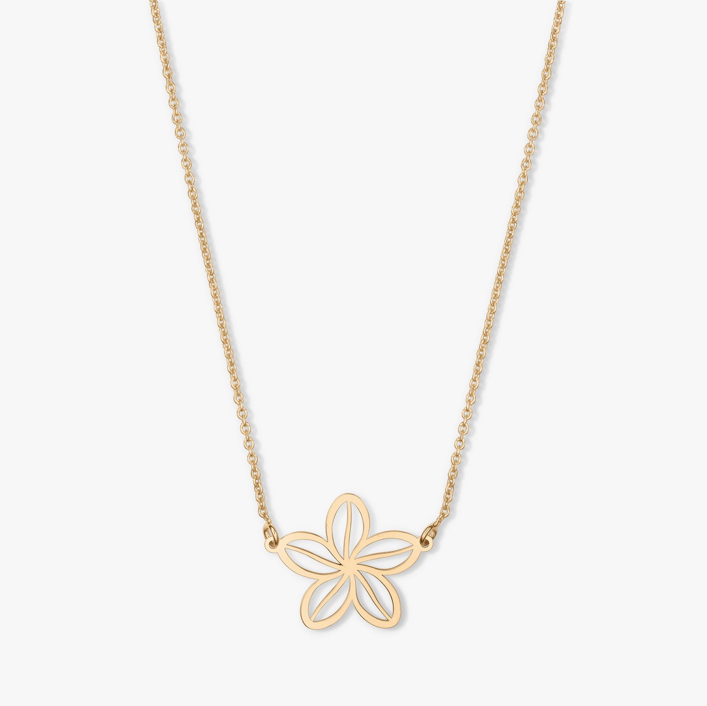 Gold necklace with a flower-shaped pendant on a white background.