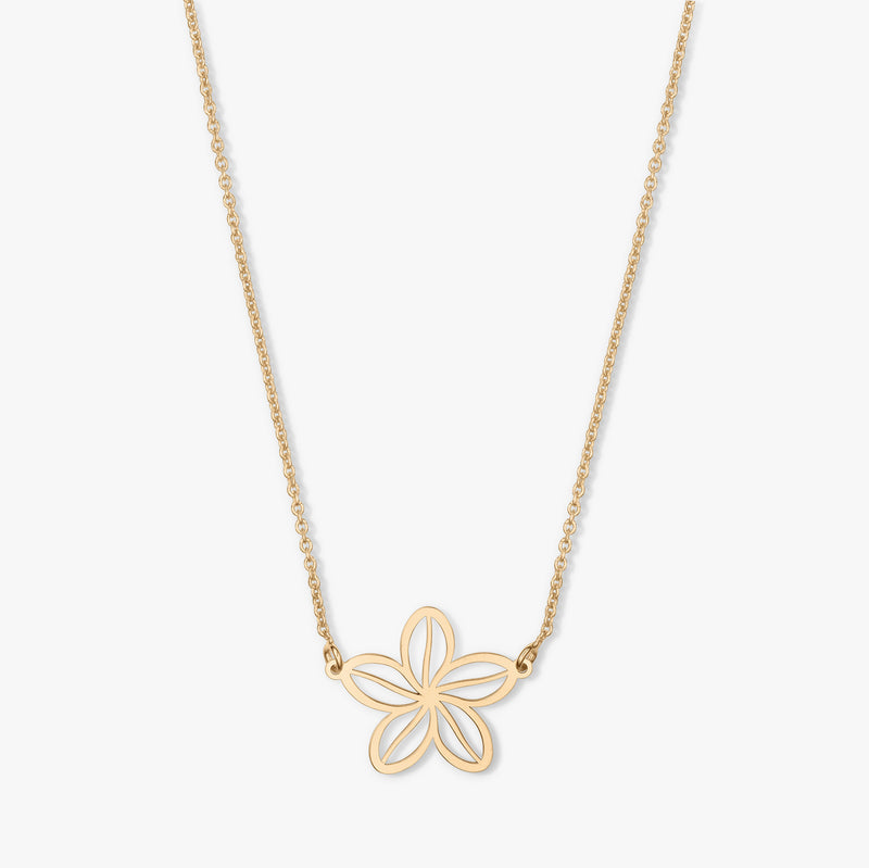 Gold necklace with a flower-shaped pendant on a white background.
