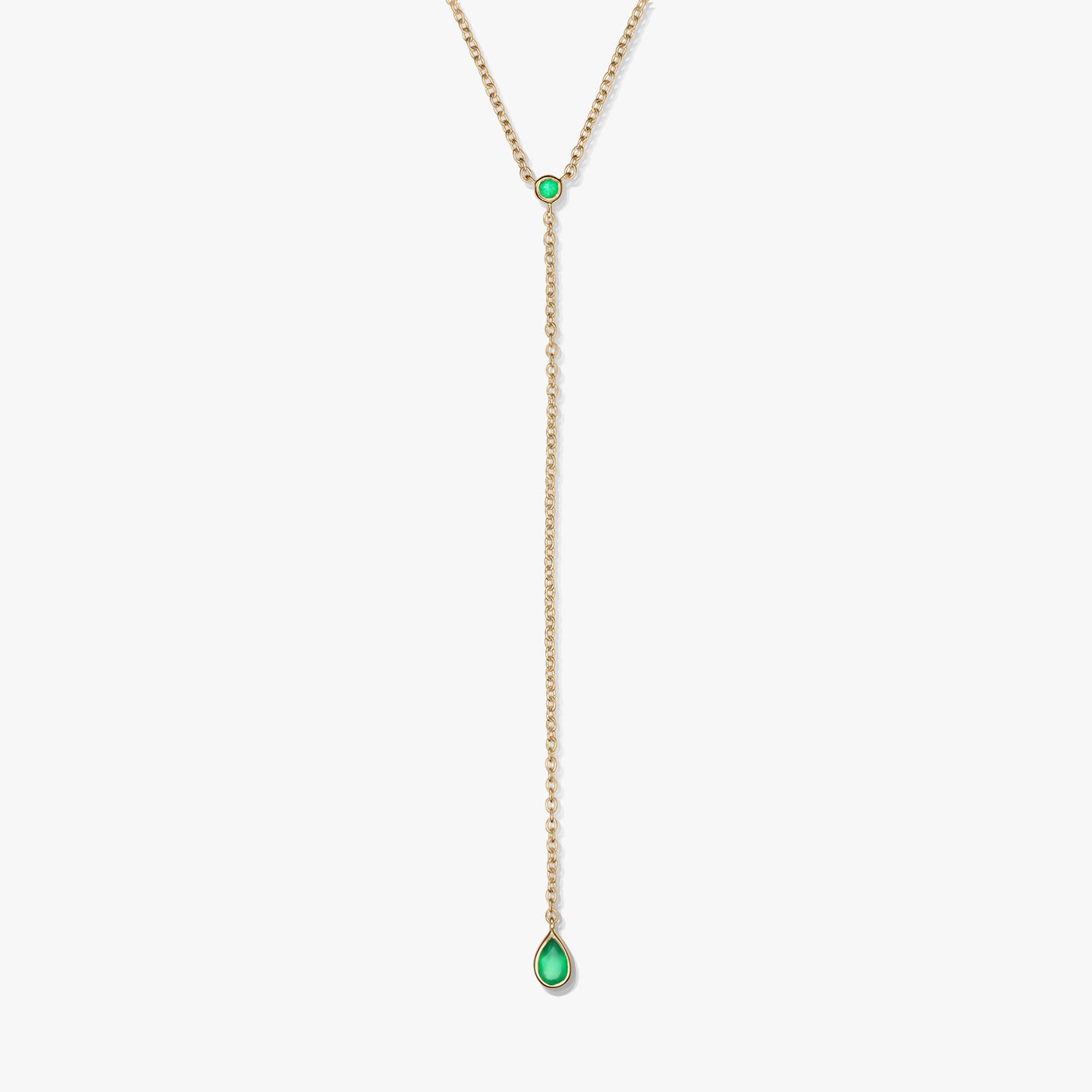 Elegant gold-plated sterling silver lariat necklace with green onyx accents and a teardrop drop pendant, photographed on a white background.