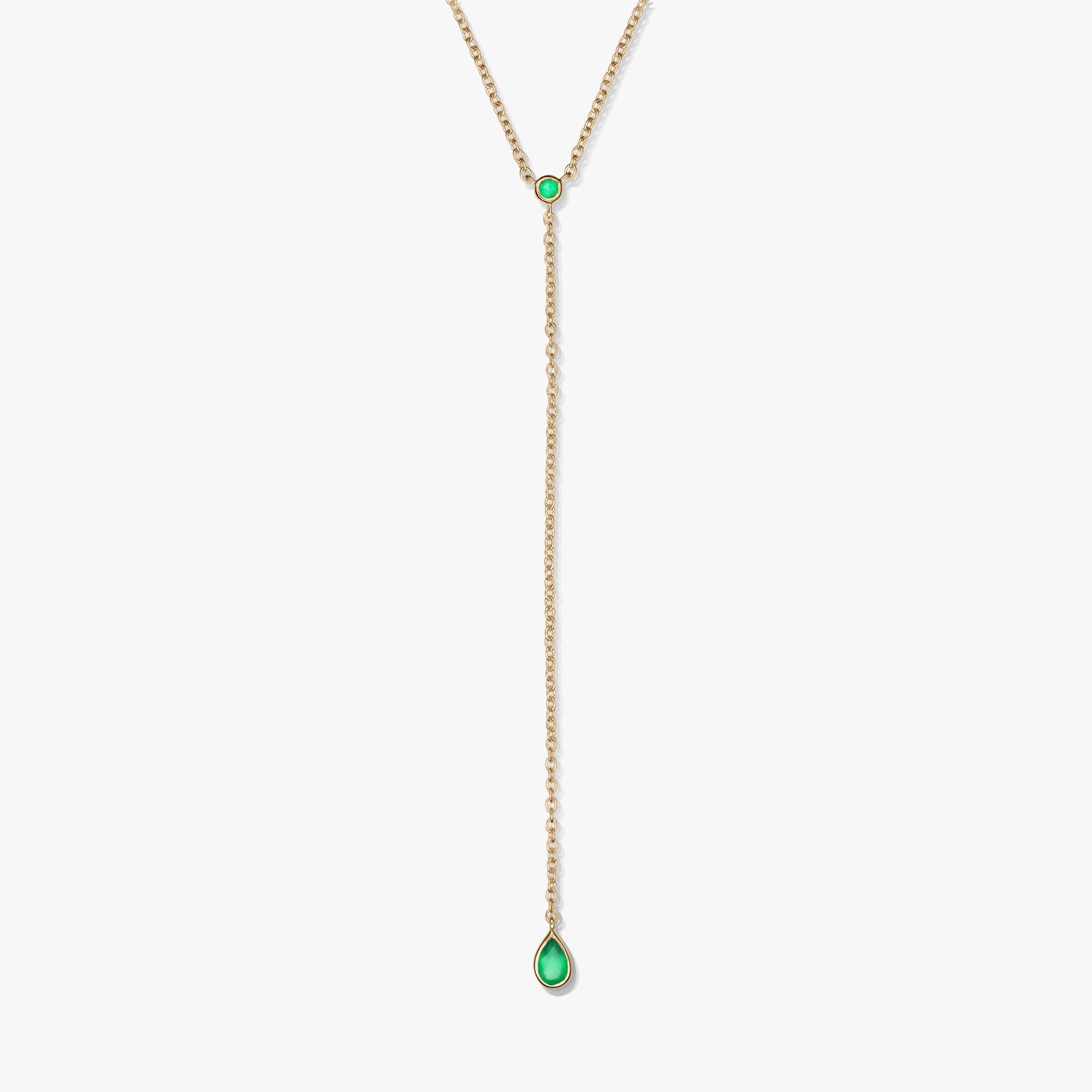 Elegant gold-plated sterling silver lariat necklace with green onyx accents and a teardrop drop pendant, photographed on a white background.