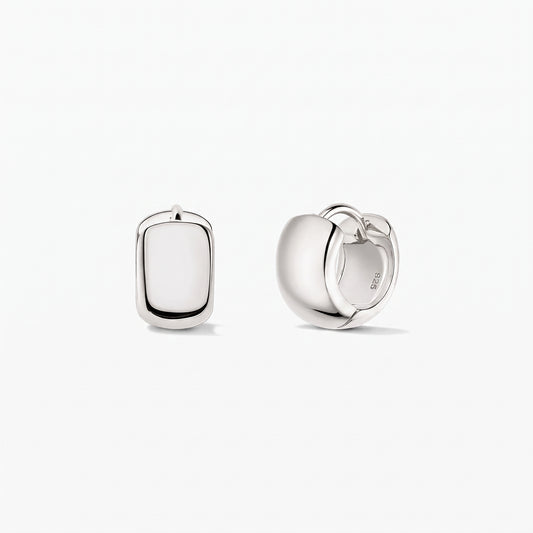 Bold Mini Hoops Silver Earrings in 925 sterling silver by Indira, shown on a white background—one earring front-facing and the other in side view showing the hinged clasp.