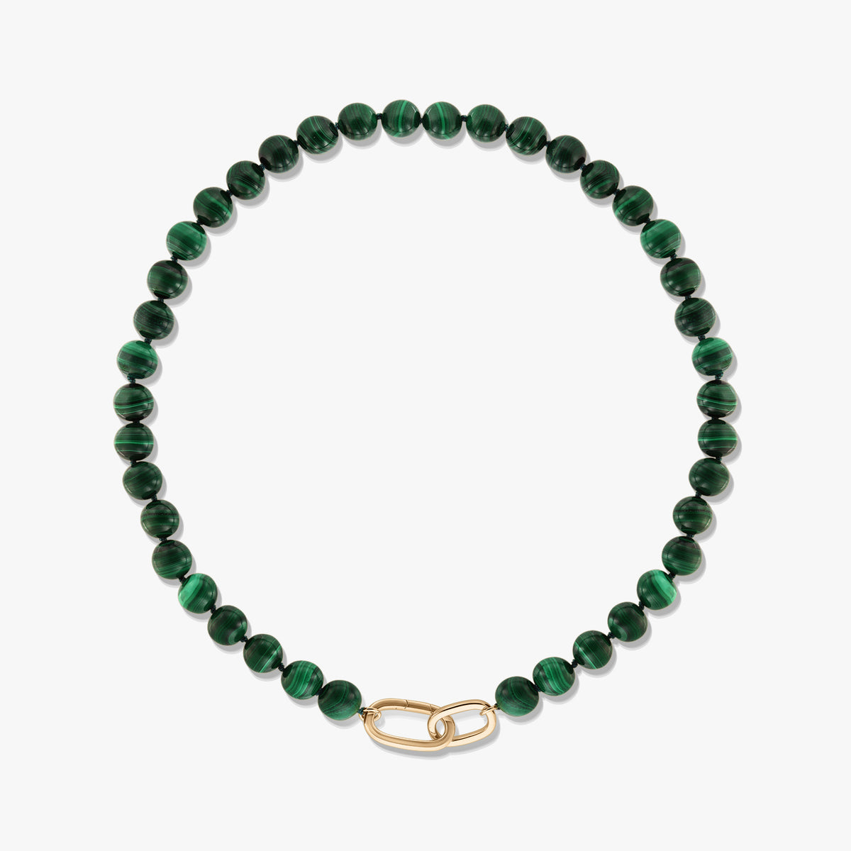 Green malachite beaded necklace with a gold-plated sterling silver paperclip clasp on a white background.