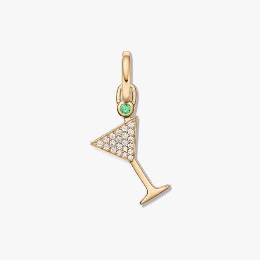 Gold-tone 925 sterling silver martini glass pendant featuring pavé clear zirconia and a small green gemstone, set against a white background.