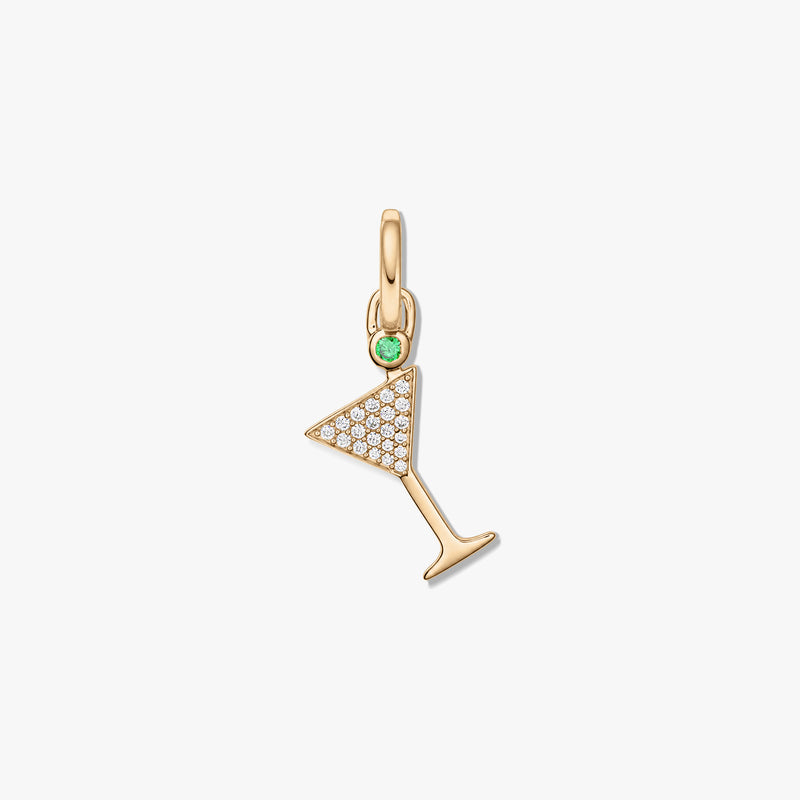 Gold-tone sterling silver pendant in the shape of a martini glass, adorned with pavé clear zirconia and a small green stone accent on a white background.