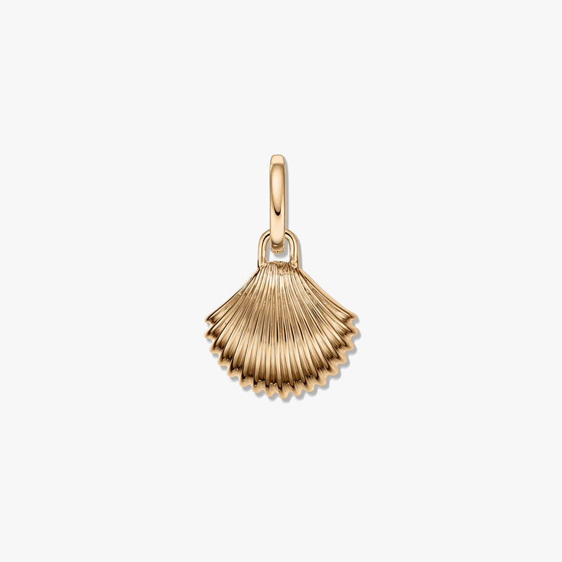Golden silver shell pendant with a ridged fan shape and polished finish on a white background.