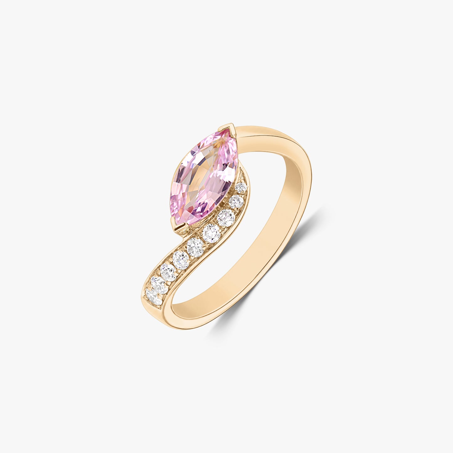 Elegant 14K yellow gold bypass ring with a marquise‑cut pink sapphire and a row of natural diamonds, isolated on a white background.