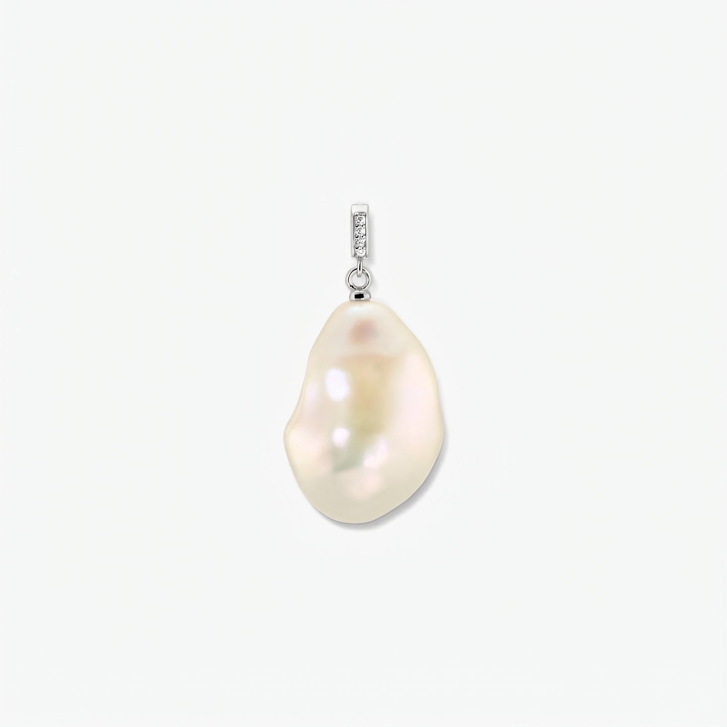 Elegant rhodium-plated baroque pearl pendant with a zirconia-accented bail, centered on a clean white background.