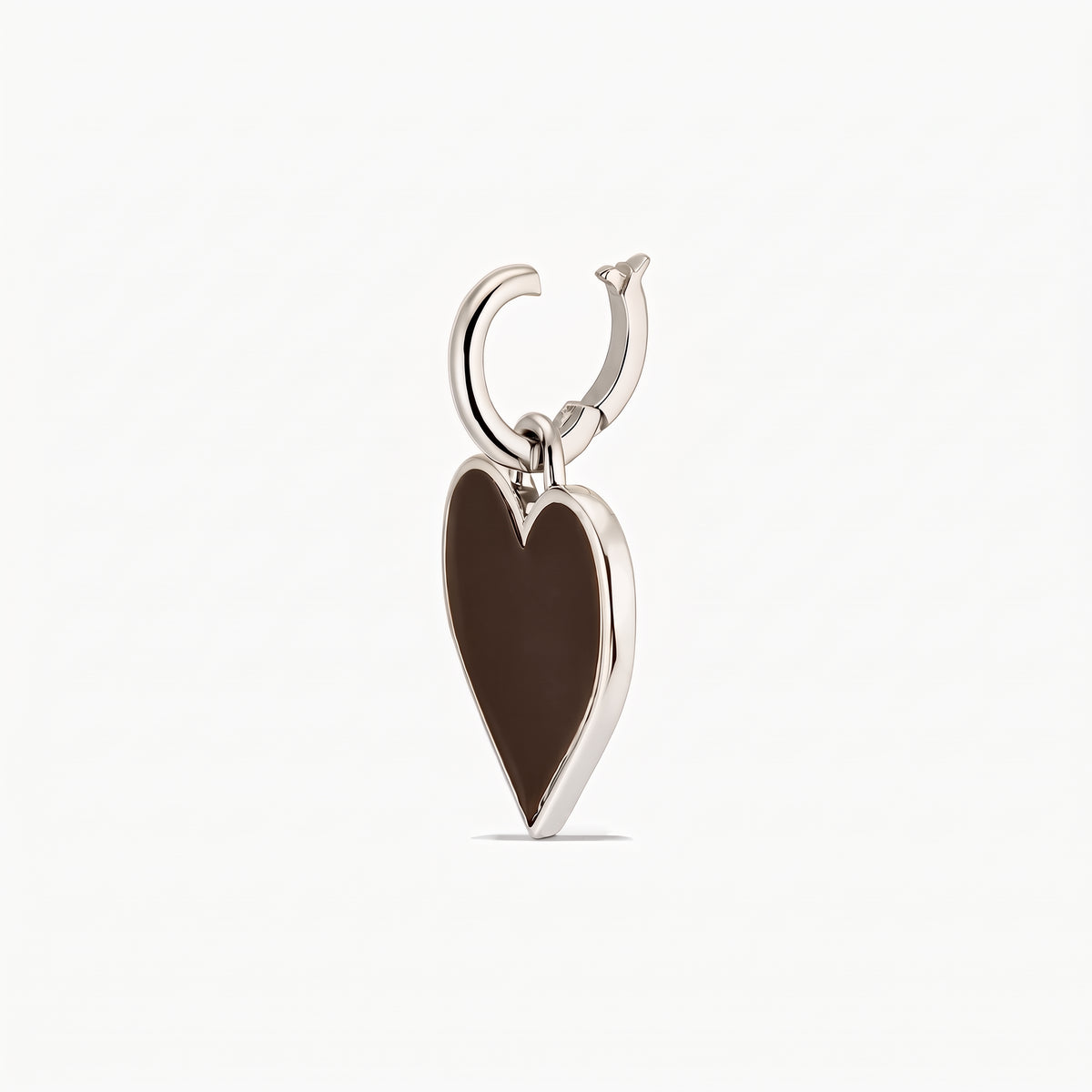 Sterling silver rhodium-plated heart pendant with a glossy brown center and hoop bail, isolated on a white background.