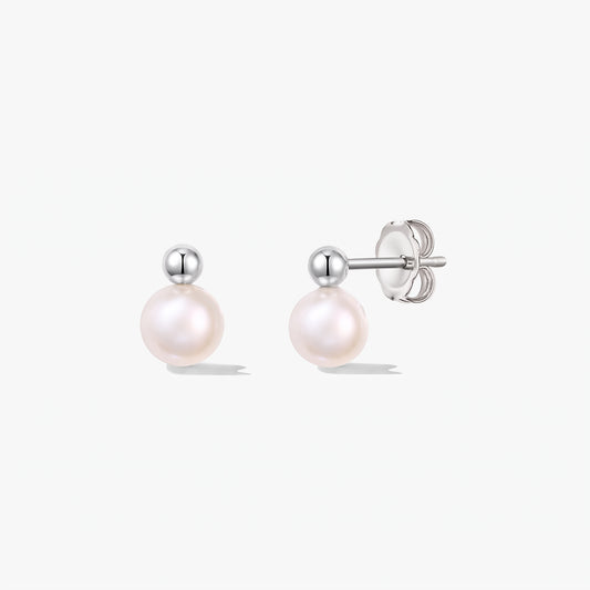 Pair of Avery sterling silver stud earrings with round cultured pearls and butterfly backs on a white background.