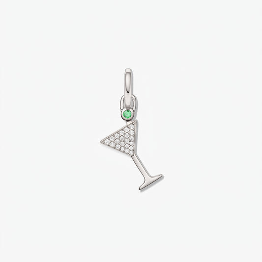 Sterling silver cocktail glass pendant with pavé white zirconia and a small green accent stone, isolated on a white background.