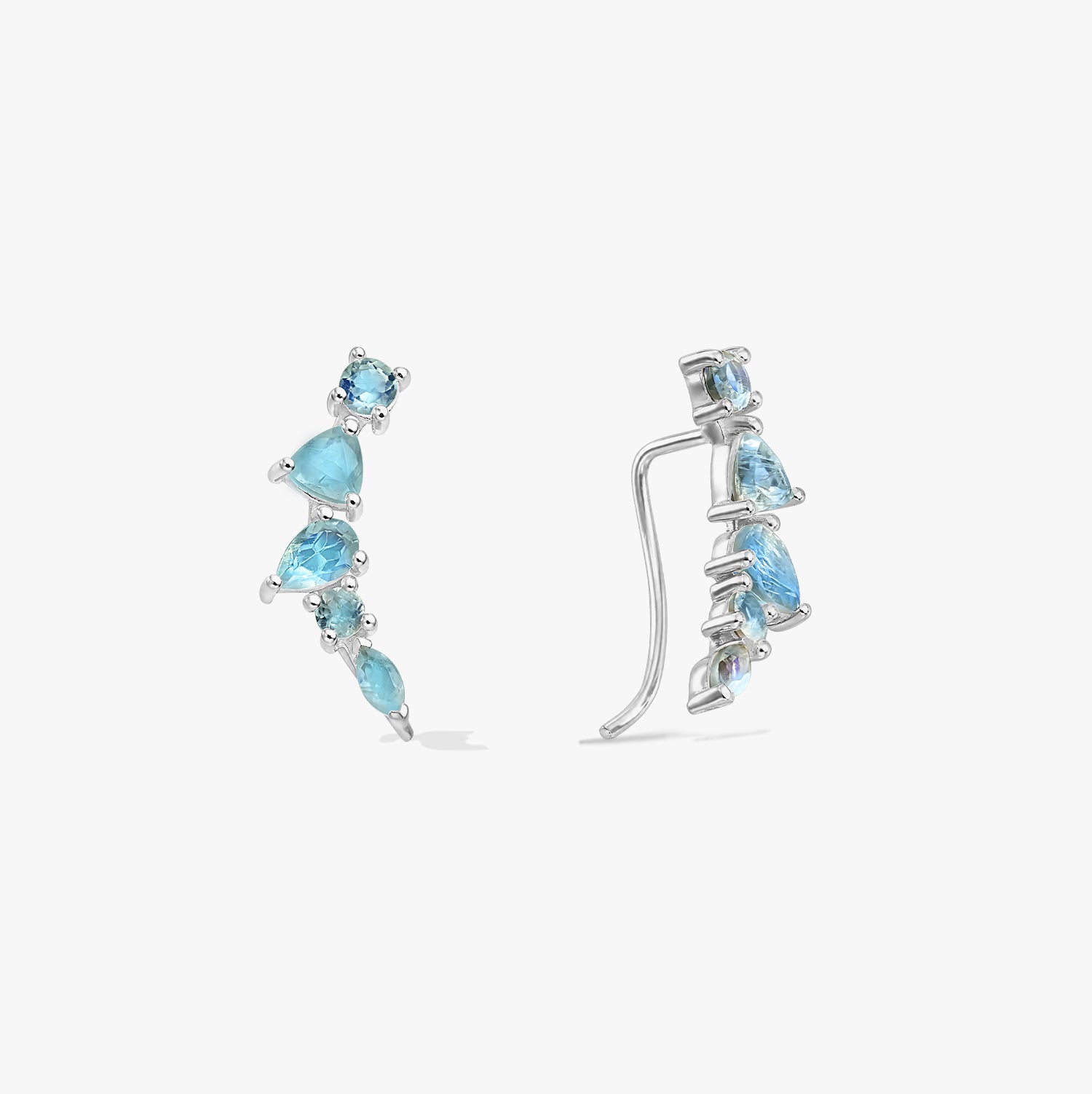 A pair of sterling silver ear climber earrings featuring graduated blue labradorite stones, shown on a white background in front and side views.
