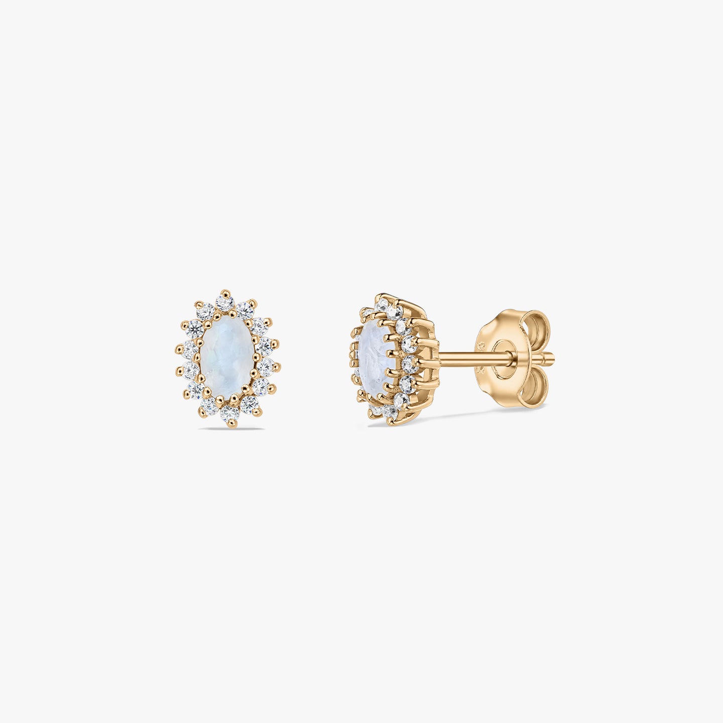 Pair of gold‑plated sterling silver stud earrings with oval moonstone centers and a halo of small white stones, shown on a white background in front and side views.