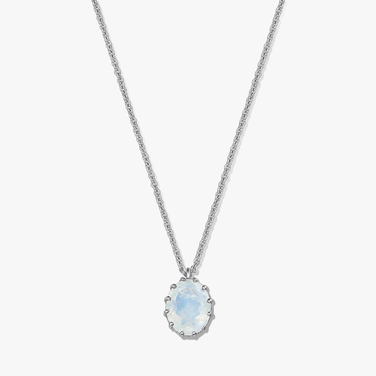 Sterling silver necklace with an oval moonstone pendant on a white background.
