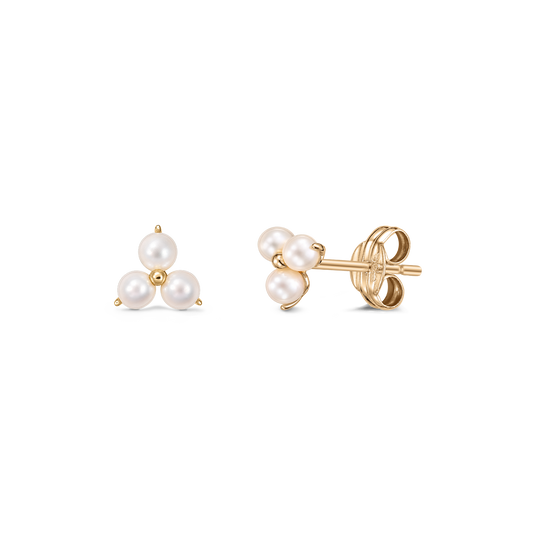 Indira Pointe gold stud earrings showcasing a trio of white cultured pearls arranged in a triangular cluster, displayed front and side on a transparent background.