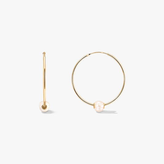 Golden Ines silver hoop earrings with cultured pearls, displayed front and side on a white background.