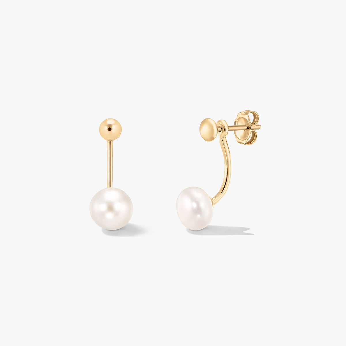 Elegant pair of gold-plated sterling silver ear jacket earrings with white natural pearls, shown on a clean white background.