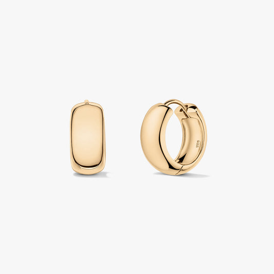 Pair of gold‑plated sterling silver maxi hoop earrings on a white background, shown front and side to highlight the chunky dome shape and hinged huggie clasp.