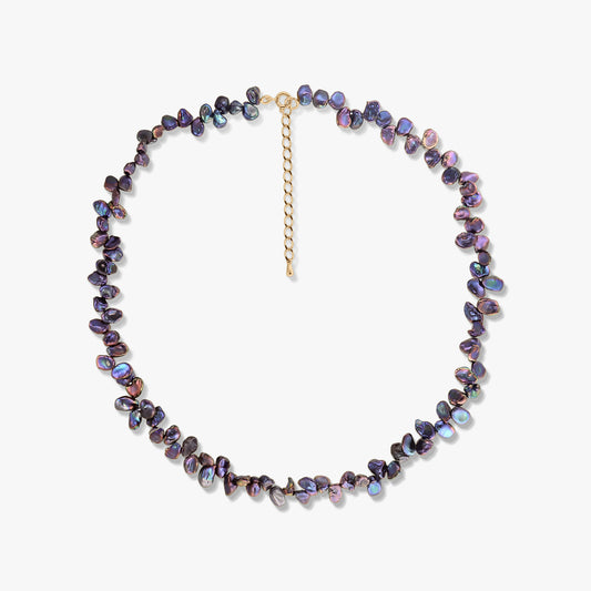 Golden Mini Lulu silver necklace with black keshi pearls and a gold‑plated extender chain on a white background.