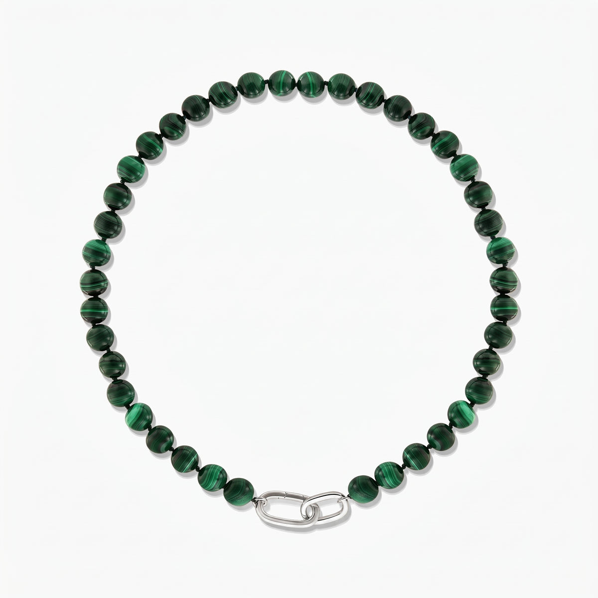 Malachite bead necklace with a silver paperclip clasp, photographed on a white background.