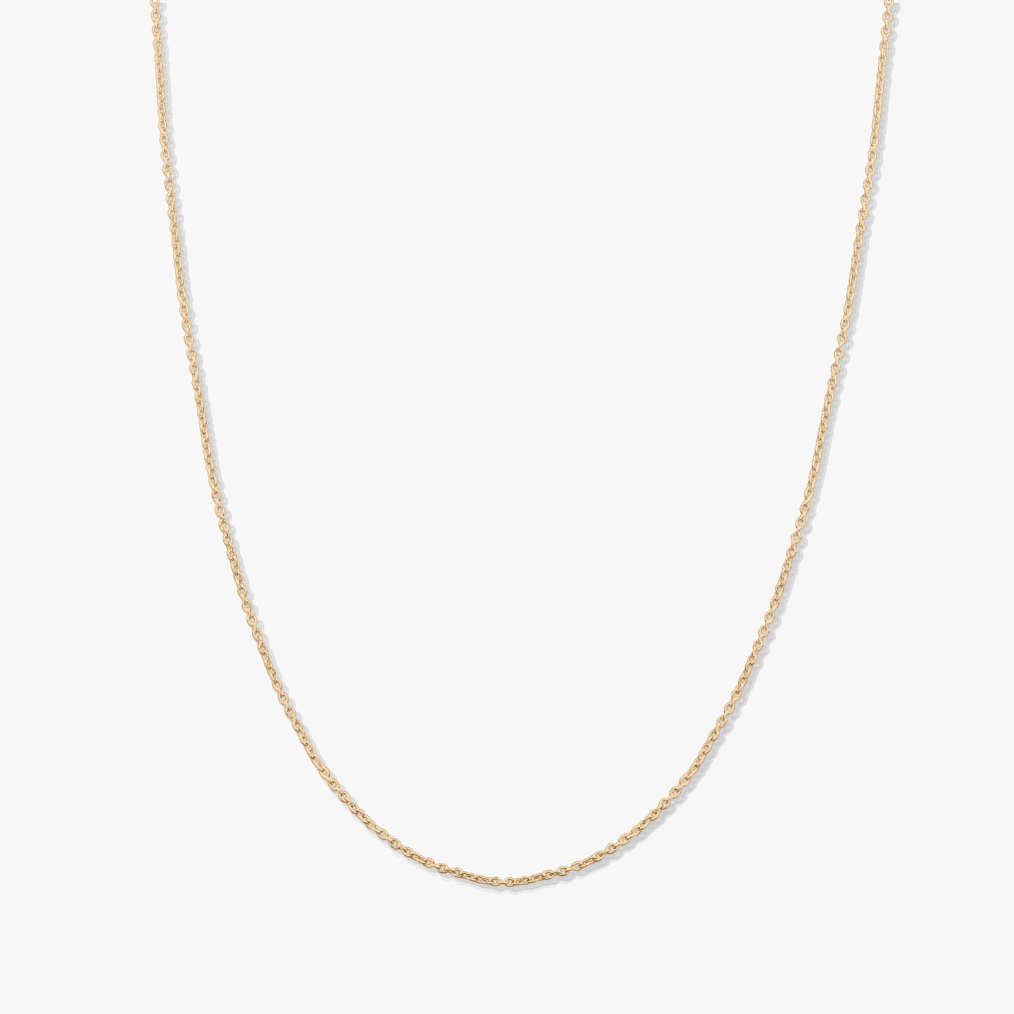 Minimal 14K yellow gold chain necklace photographed on a solid white background.