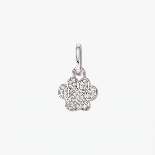 Sterling silver paw print pendant adorned with white cubic zirconia on a polished bail, isolated on a white background.