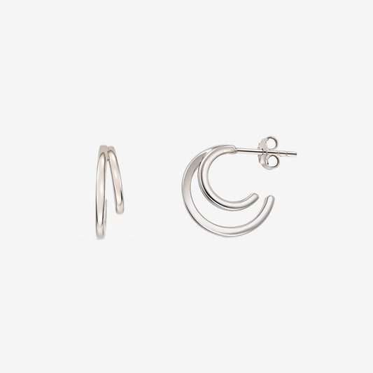Siamese Silver Earrings by Indira — double hoop sterling silver stud earrings with butterfly backs on a white background.