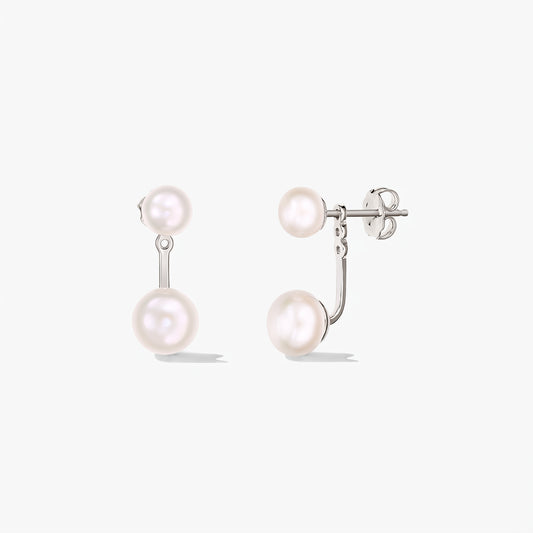 Pair of Duo 925 silver earrings with natural white pearls in a double‑pearl ear‑jacket design on a white background.