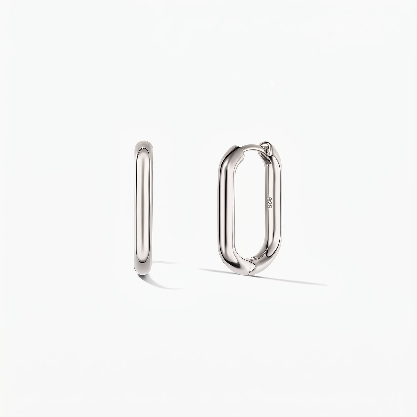 Pair of silver square hoop earrings on a white background, one shown from the side and one slightly open to reveal the hinged clasp.